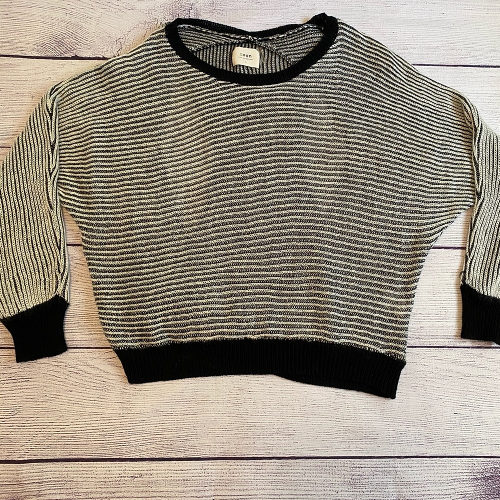 Black and white partial open back sweater